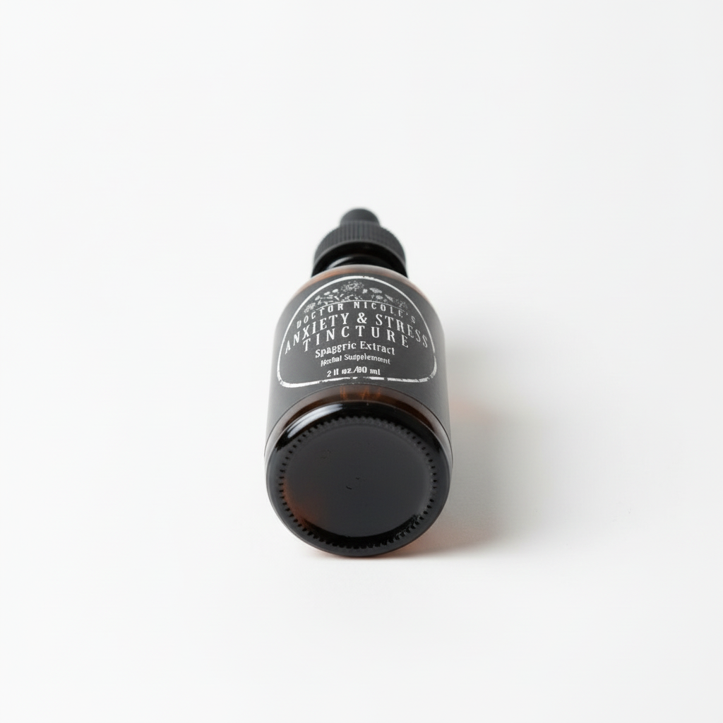 A low-angle view of a brown glass bottle of Doctor Nicole's Anxiety & Stress Tincture on a white surface.