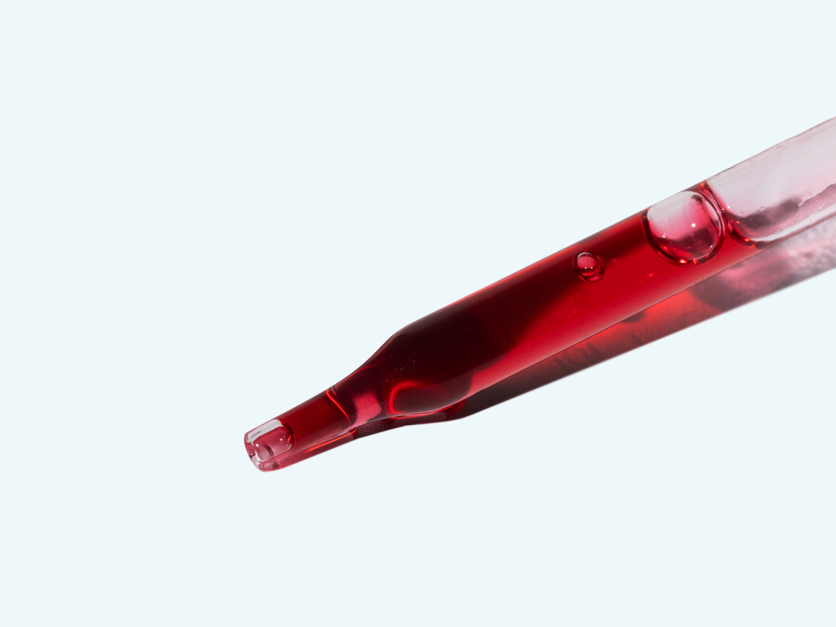 Neupril liquid dropper showing the bioactive, berry-flavored methylfolate and B12 supplement.