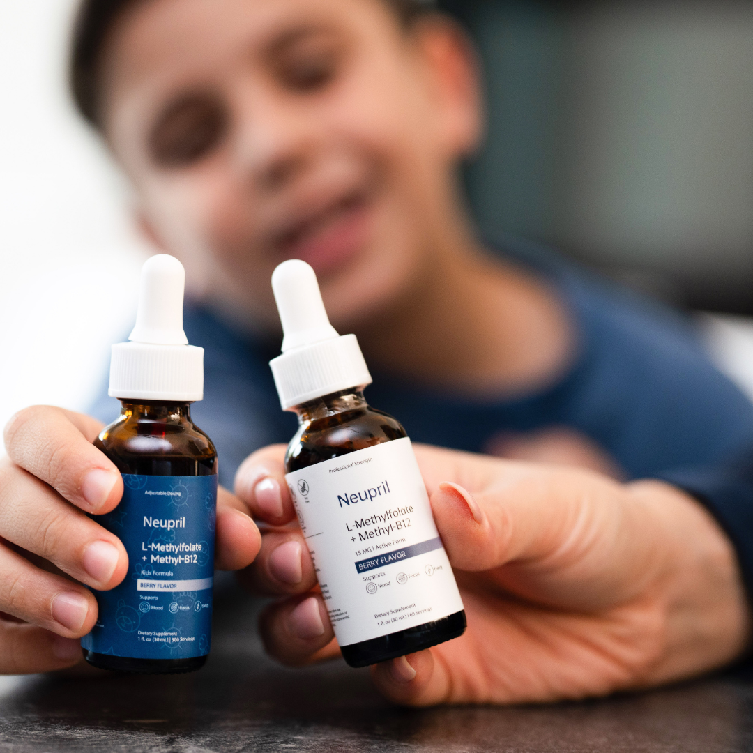 Child holding Neupril Kids Methylfolate supplement bottle