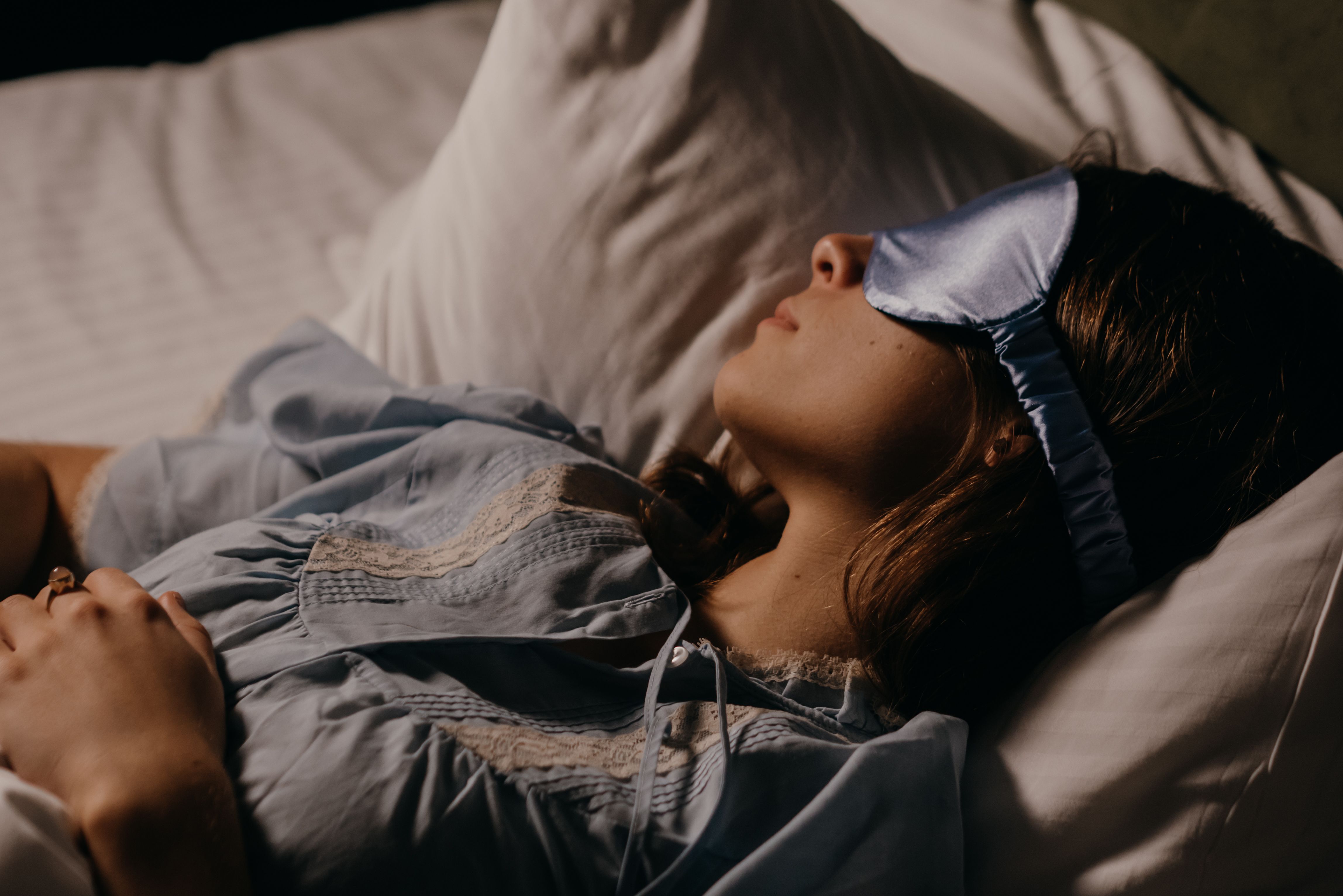 A woman resting after taking supplements for better sleep