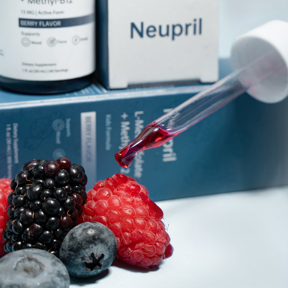 Neupril bottle held over grass
