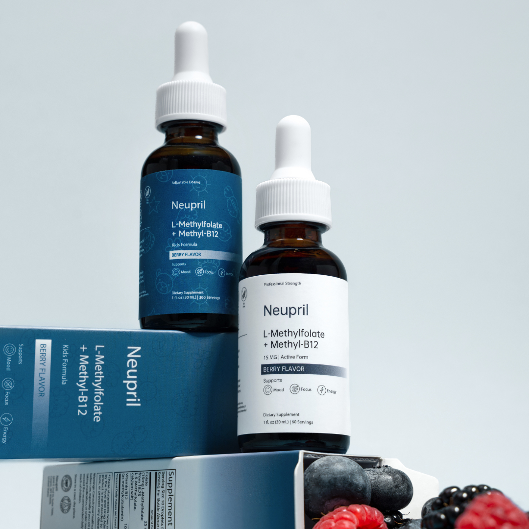 A vertical stack of Neupril products: a blue Kids Formula dropper bottle sits atop its box, next to a white Professional Strength bottle. In the foreground, an open box reveals fresh raspberries, blueberries, and blackberries, with the supplement facts panel visible on the side of the white box.
