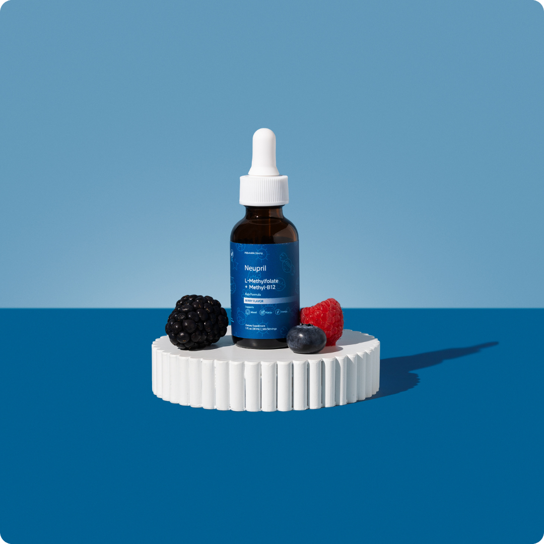 Neupril kids bottle on white stand with berries