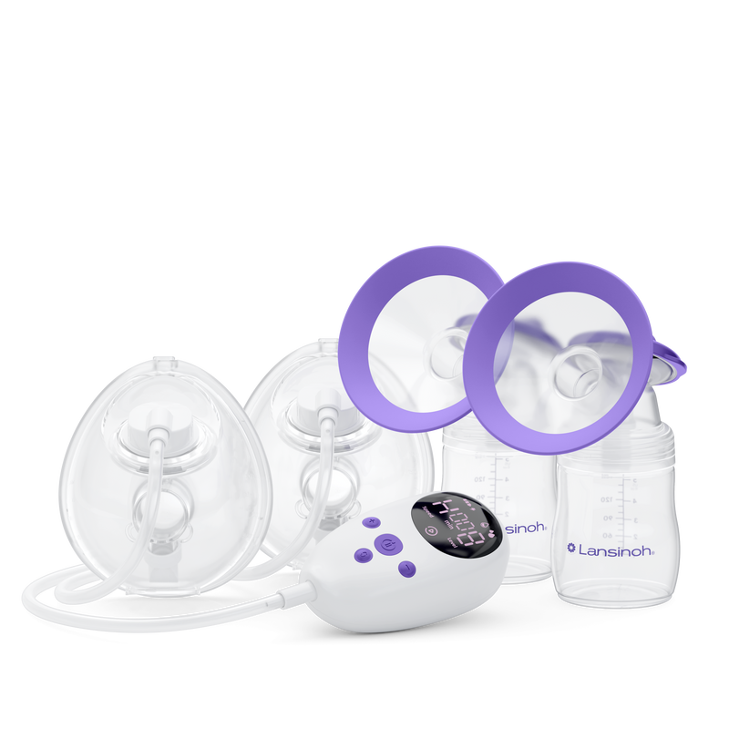 Breast pump set with bottles, flanges, and digital control unit.