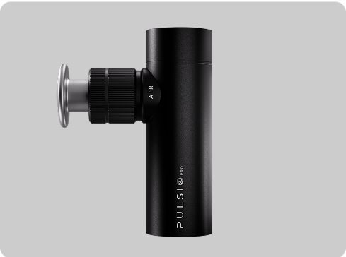 Black massage gun with 'PULSIO PRO' branding on a gray background.