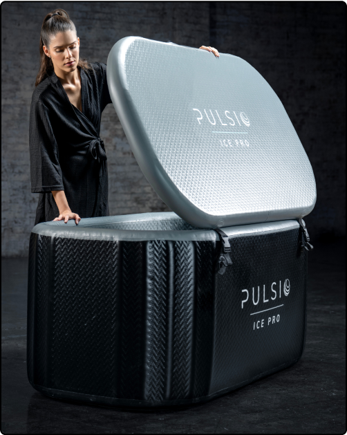 Person in robe opening a Pulsio Ice Pro ice bath.