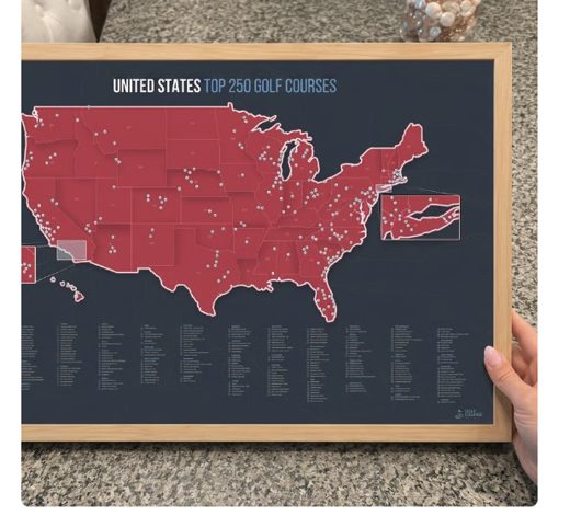 A framed map of the United States showing the locations of the top 250 golf courses.