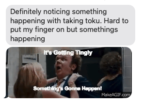 Text message above a GIF of a surprised man being held by a woman.