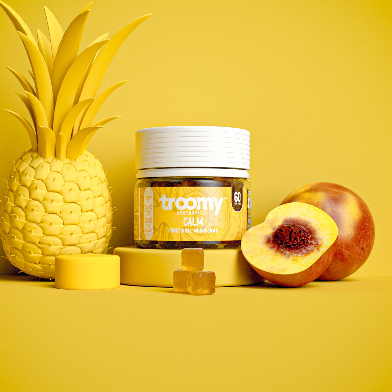 A jar of Troomy Calm gummies is displayed with a yellow pineapple and peaches on a yellow background.