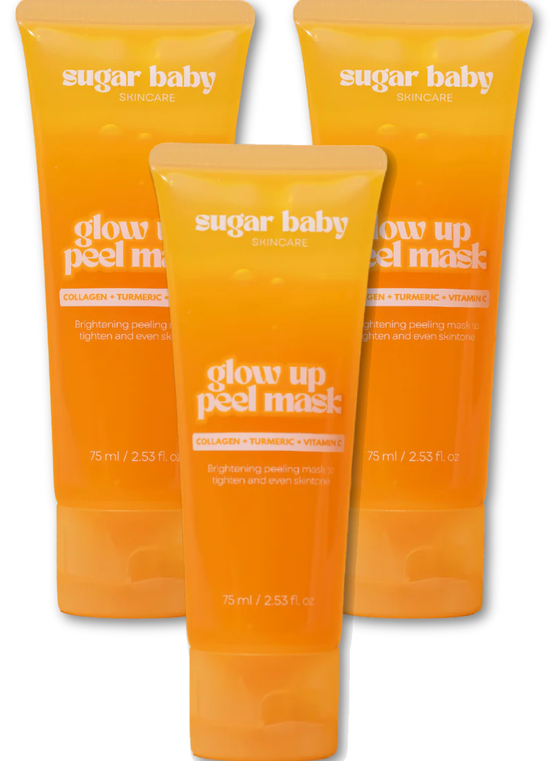 Three orange skincare tubes labeled 'glow up peel mask.'