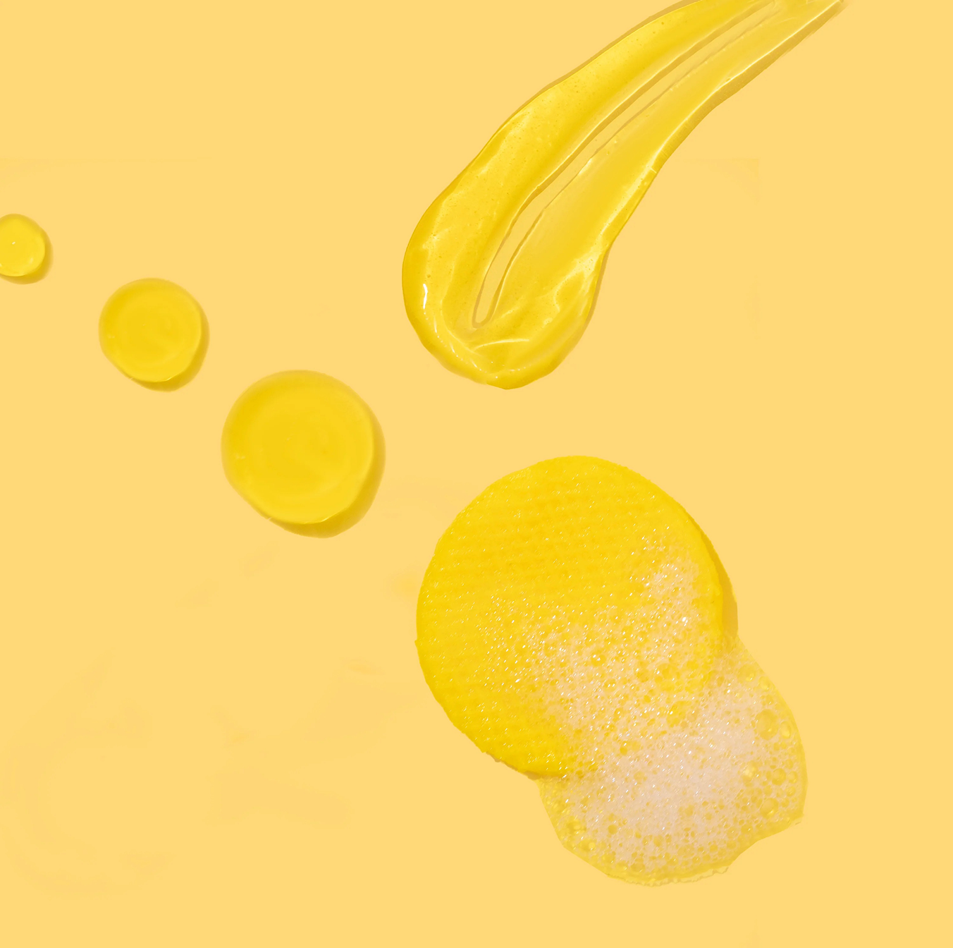 Yellow smears and circles on a matching yellow background.