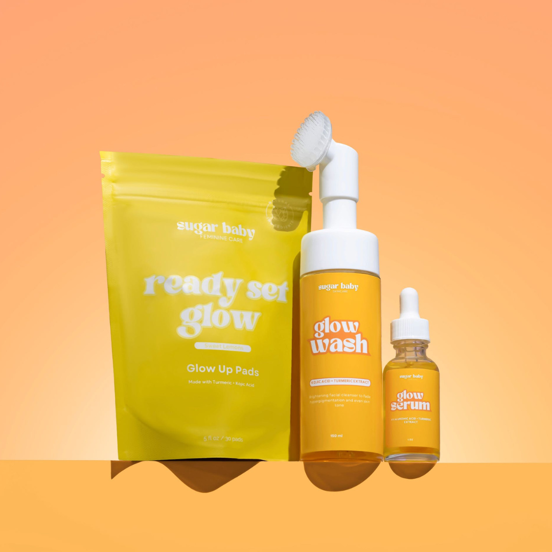Three skincare products on an orange gradient background.