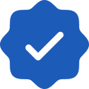 A white checkmark inside a blue, starburst-shaped badge, commonly used as a verification symbol.