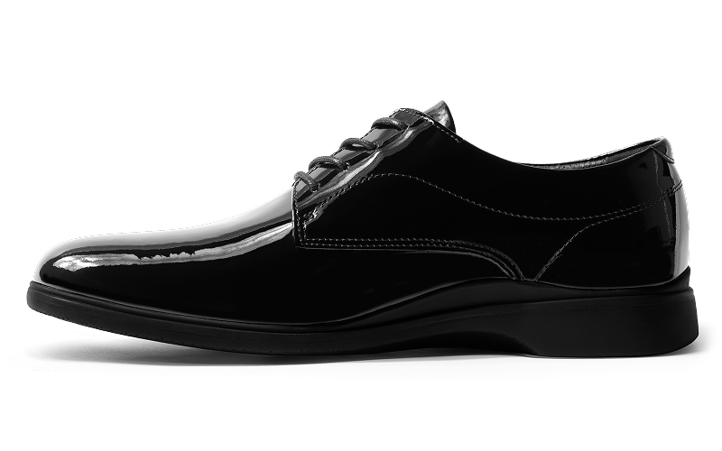 Black patent leather dress shoe with laces, side view.