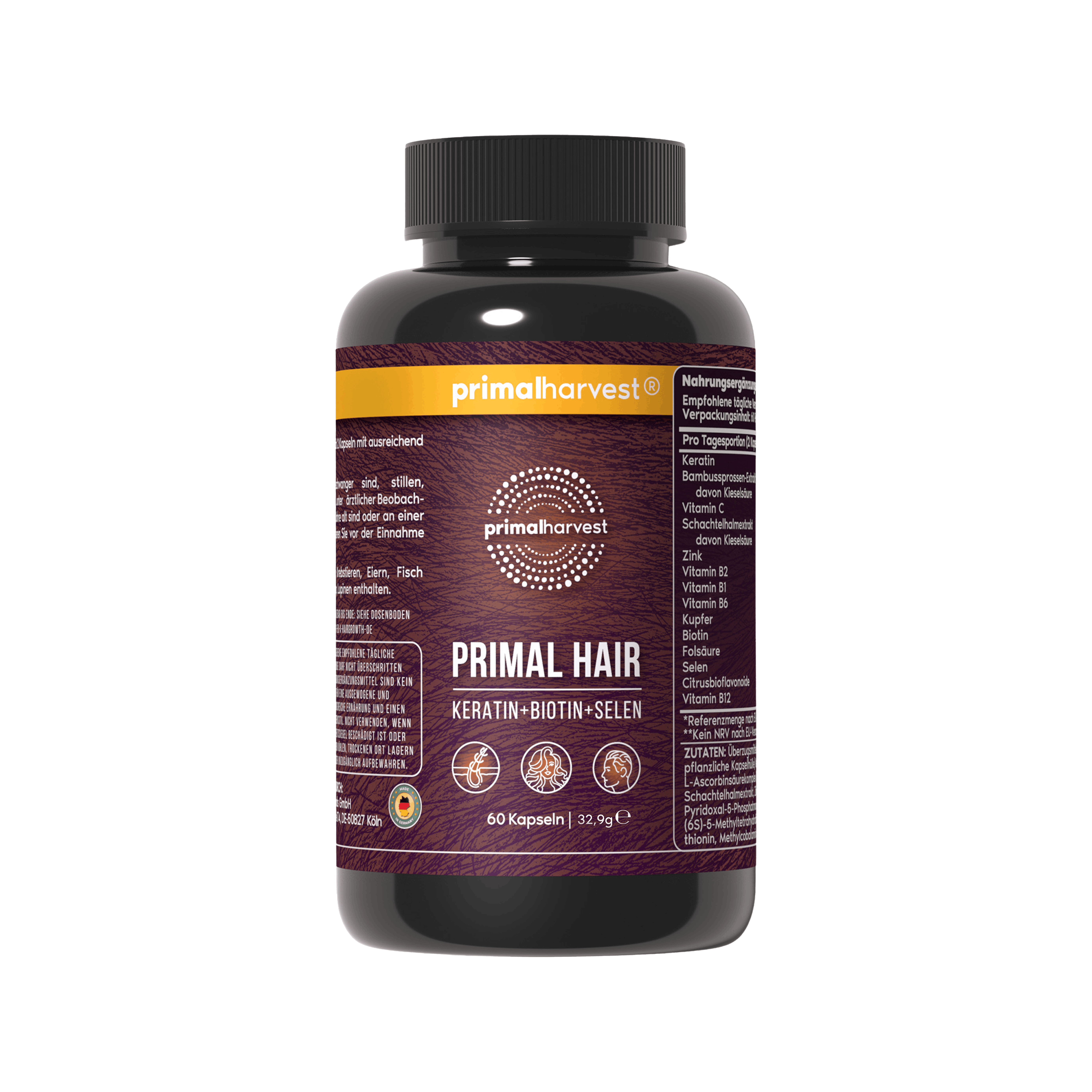A black bottle of Primal Harvest Primal Hair supplements with keratin, biotin, and selen, on a white background.