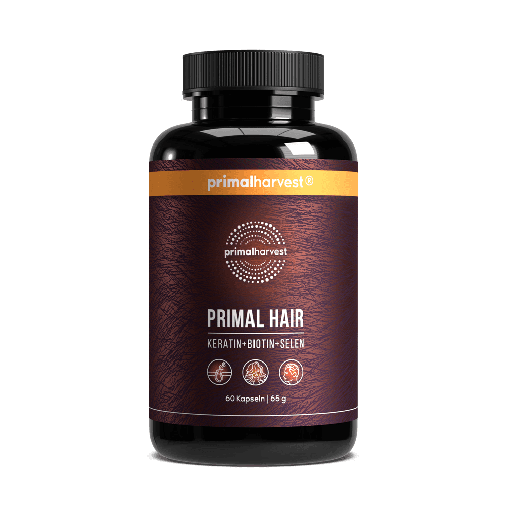 Black bottle labeled 'Primal Hair' with orange and brown accents.