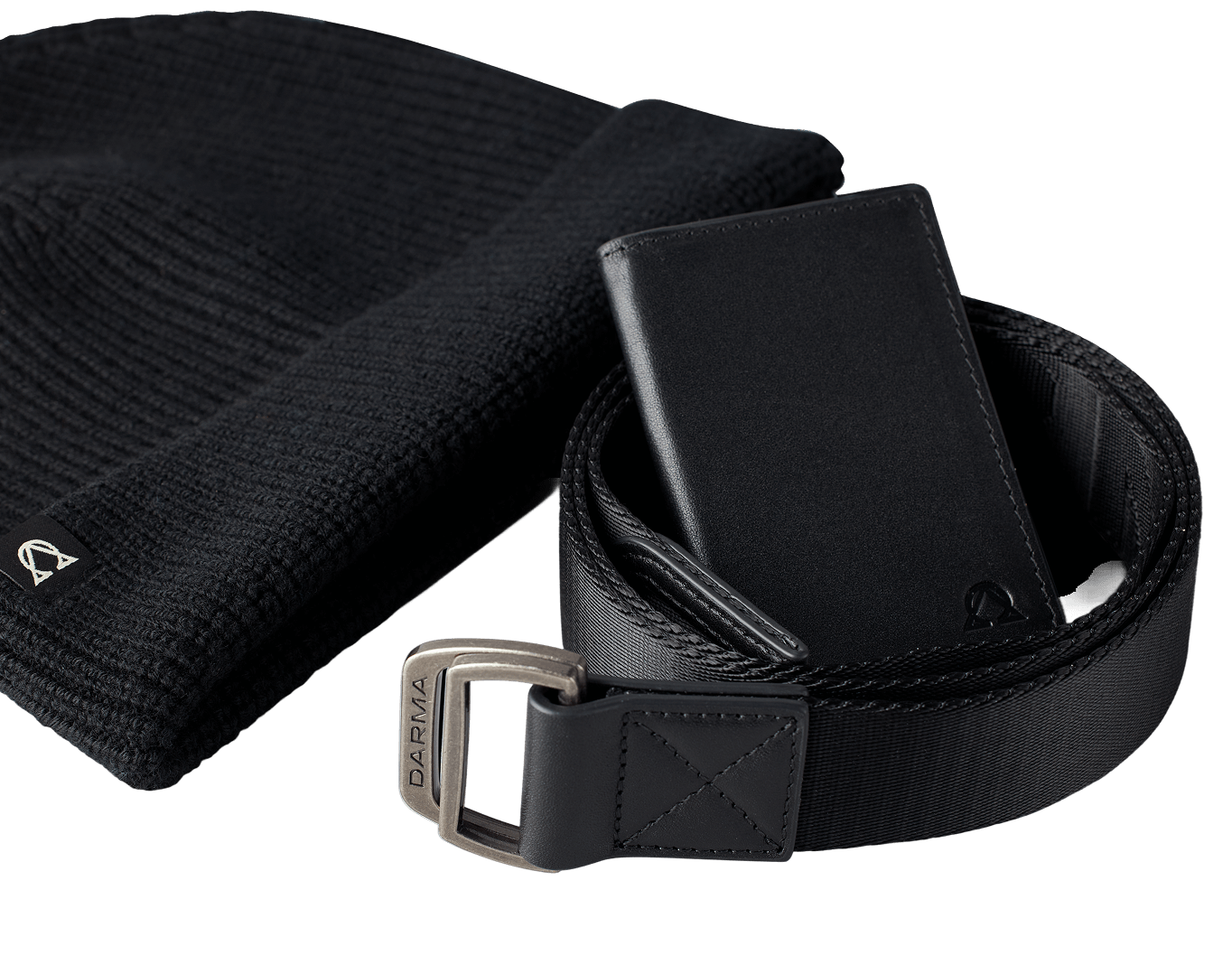 Black beanie, belt with 'Darma' buckle, and wallet on a black background.