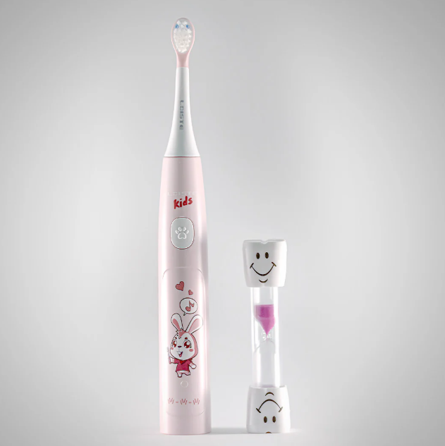 Pink kids' electric toothbrush with bunny design and sand timer.