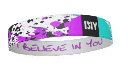 Colorful wristband with 'I BELIEVE IN YOU' text and abstract design.