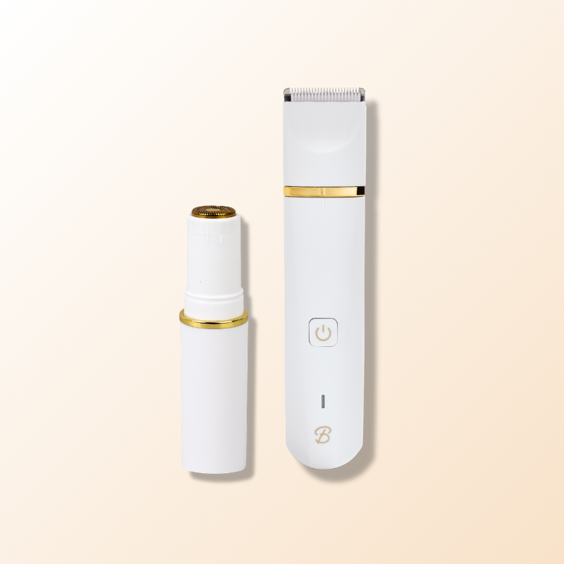 Two white and gold grooming tools, one a trimmer and one a smaller device, on a light background.