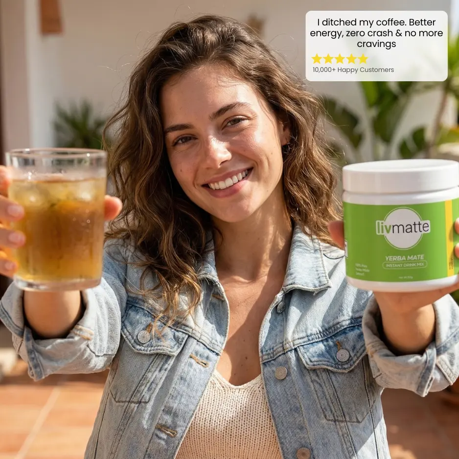 A smiling woman holds a glass of an iced drink and a container of Livmatte Yerba Mate mix.