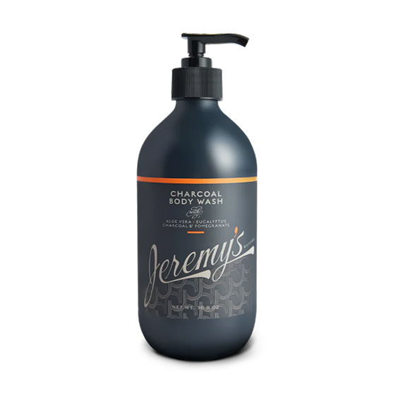 Dark bottle of charcoal body wash with pump dispenser.