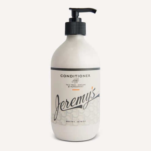 White bottle of Jeremy's conditioner with pump dispenser.