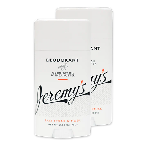 Two deodorant sticks labeled 'Jeremy's' with coconut oil and shea butter.