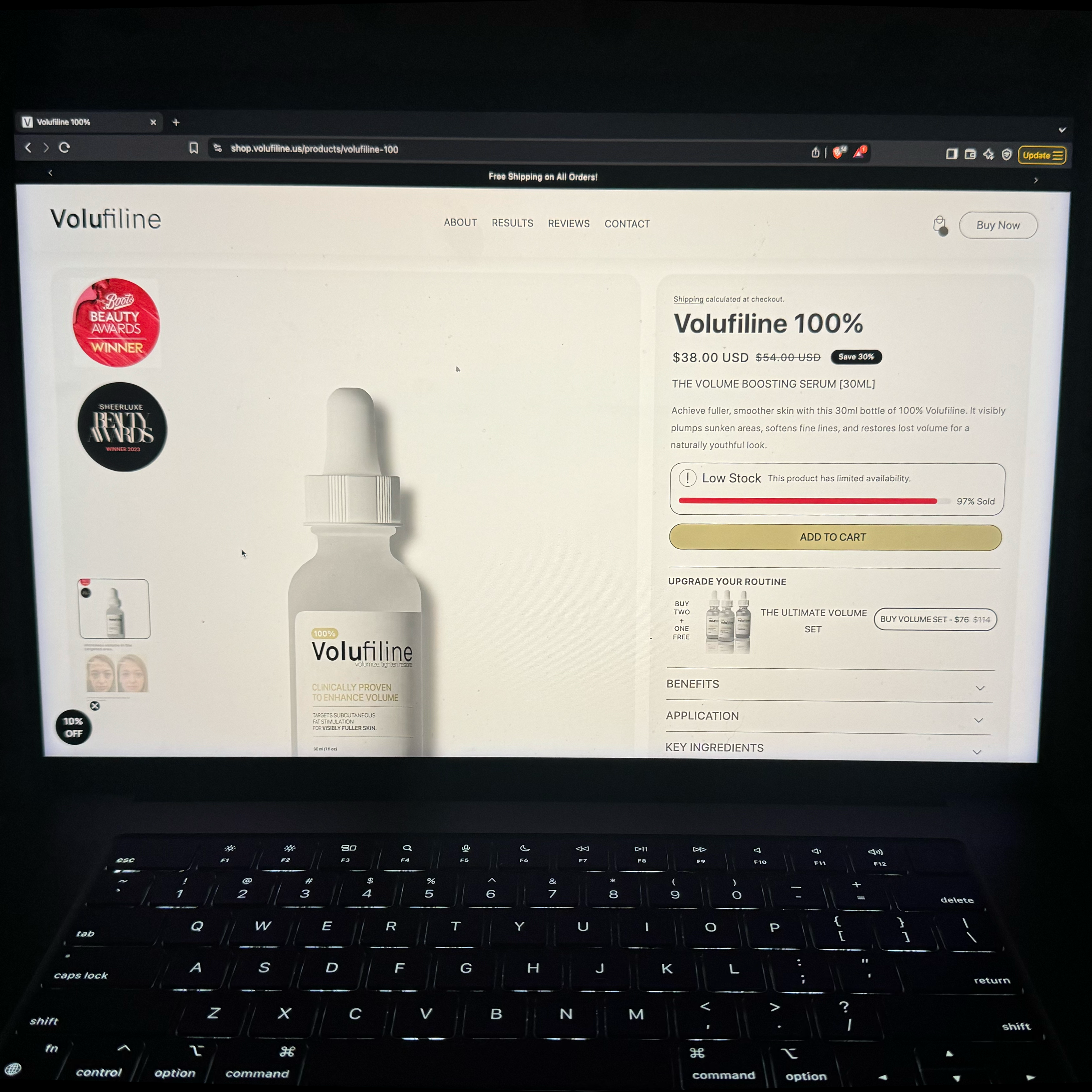 Laptop screen displaying a webpage for Volufiline serum with product details and purchase options.