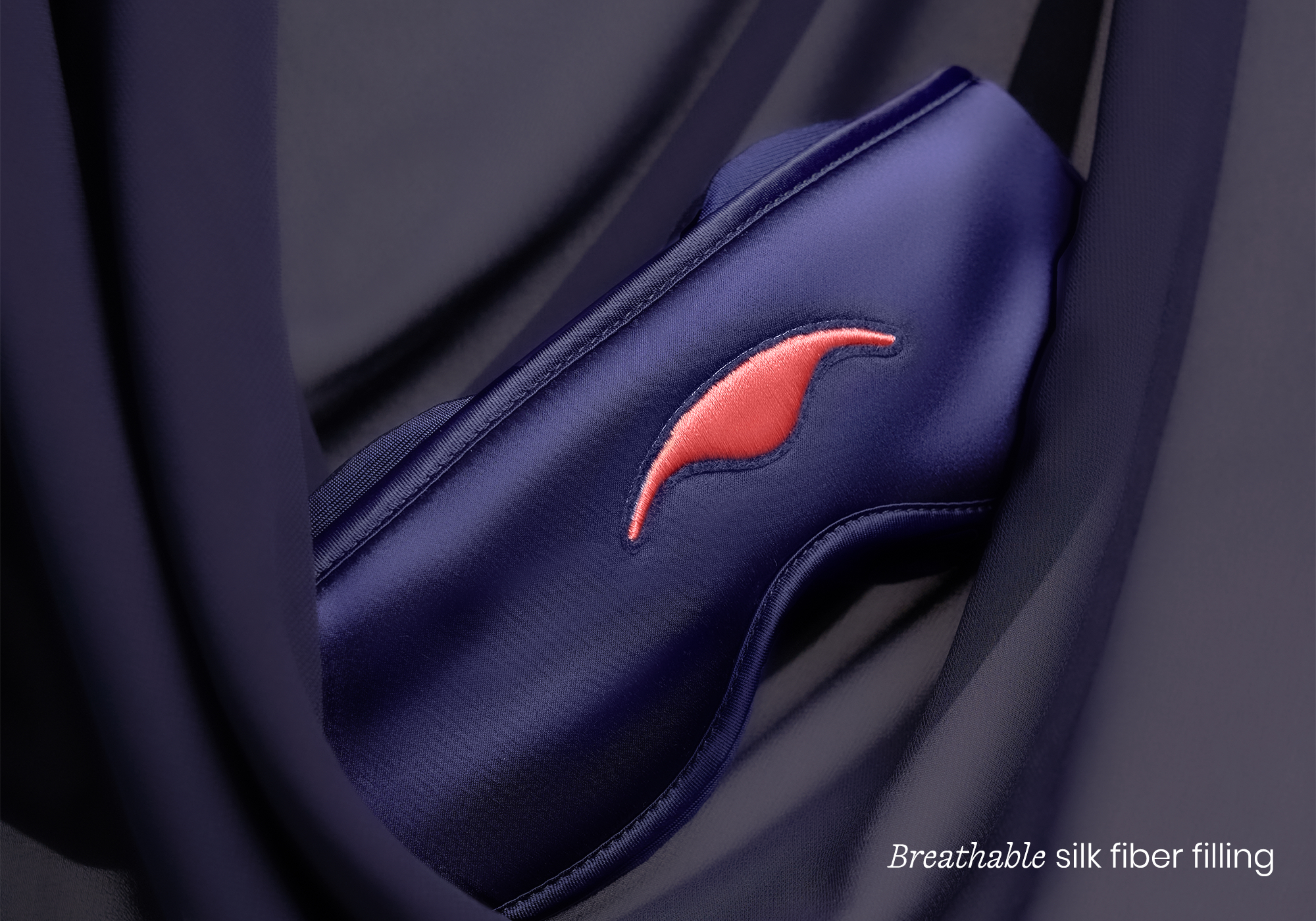 Oval speaker with turquoise top and control panel below.