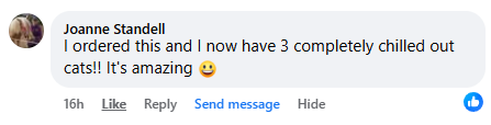 Text comment praising a product for calming cats, with a smiling emoji.