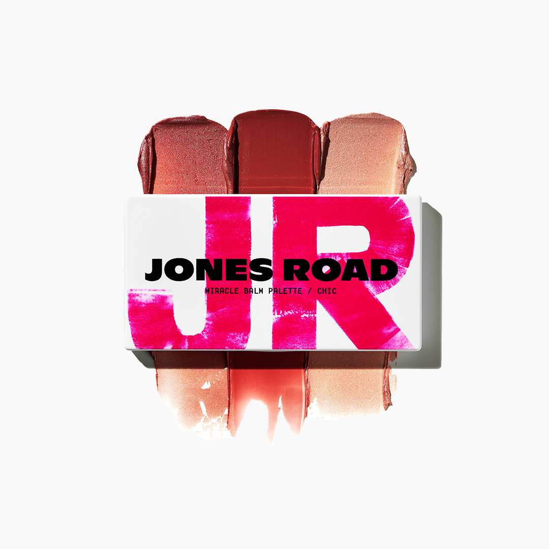 Jones Road makeup palette with three shades and bold pink lettering.