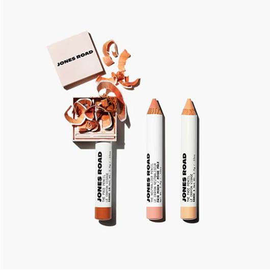 Jones Road makeup products include pencils and a compact with shavings.