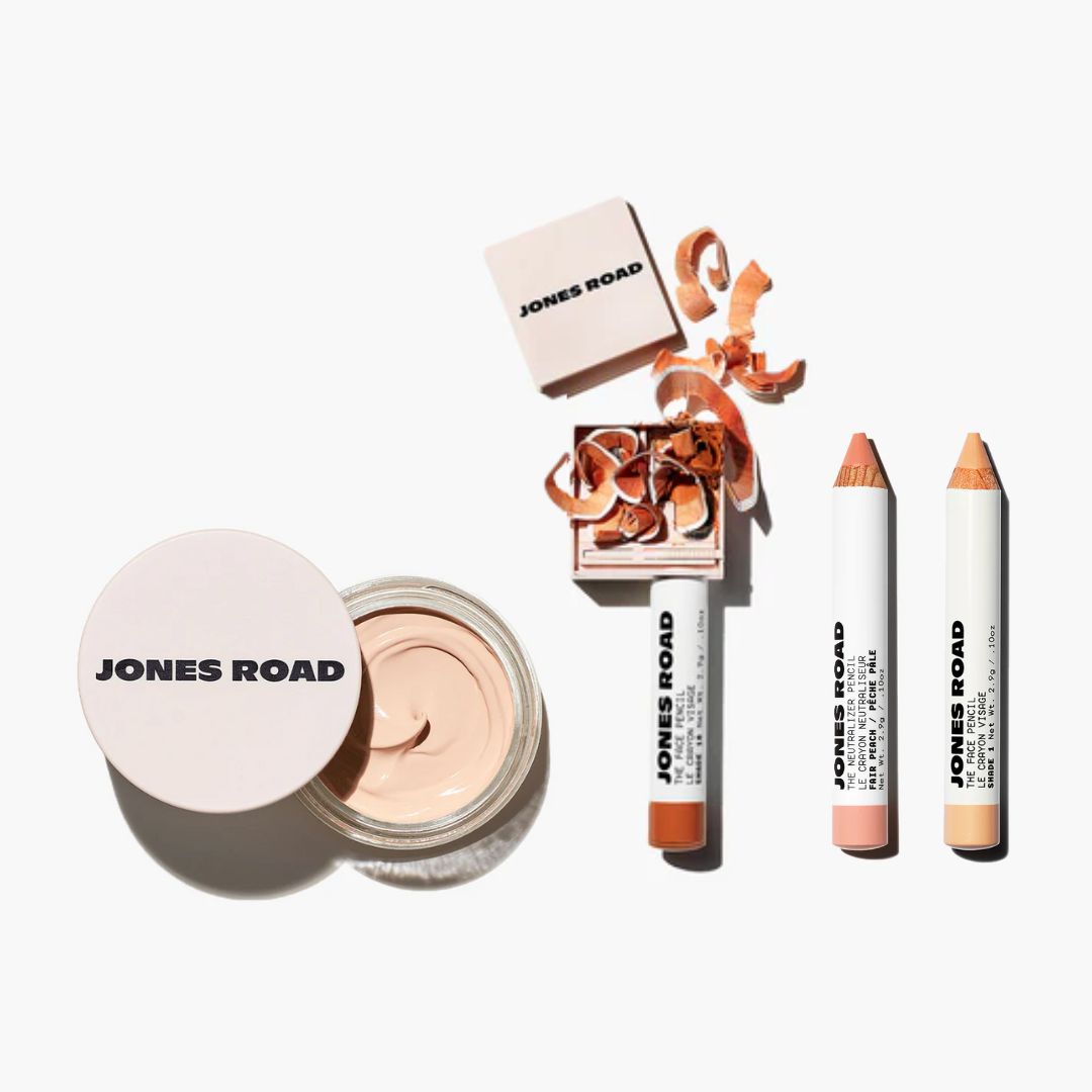 Jones Road makeup products including pencils, a jar, and a compact with shavings.
