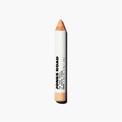 A beige makeup pencil with 'JONES ROAD' text on it.