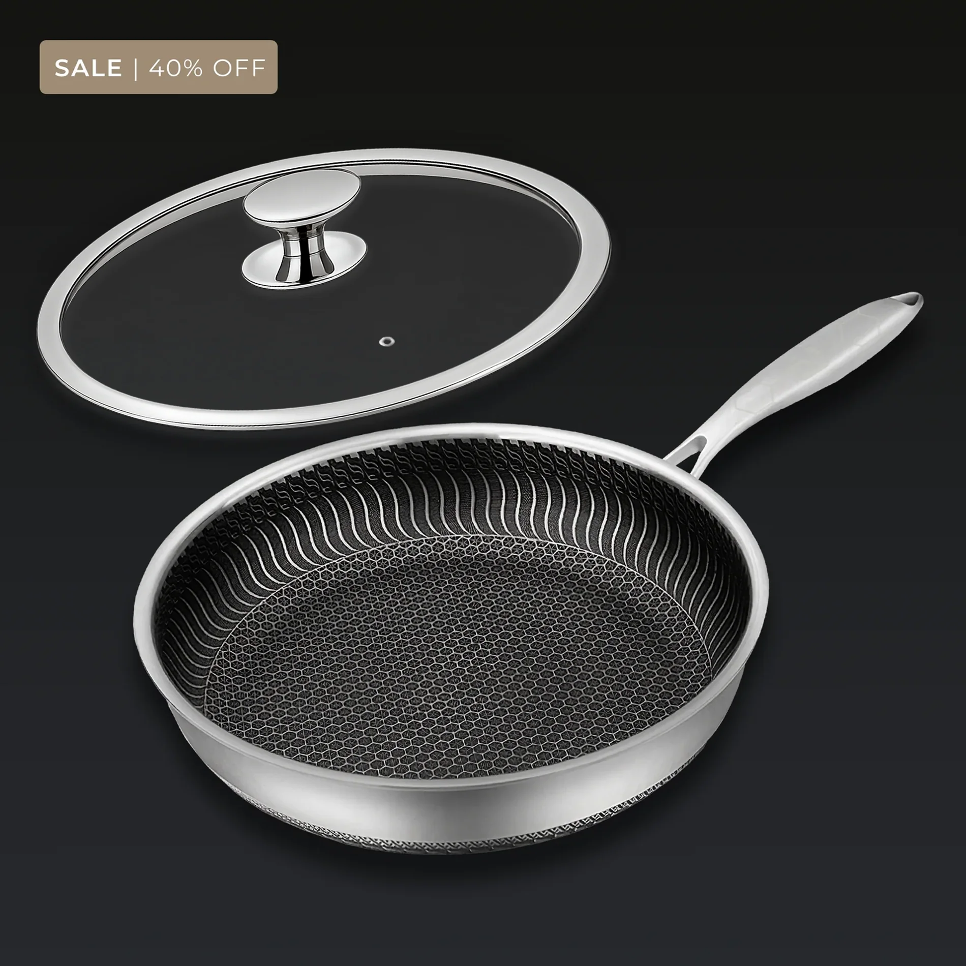 Stainless steel frying pan with a lid on a dark background, labeled 'Sale | 40% off'.