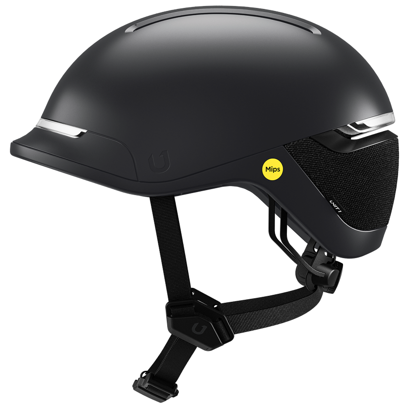 Black bicycle helmet with integrated front white light and rear red light on a dark background.