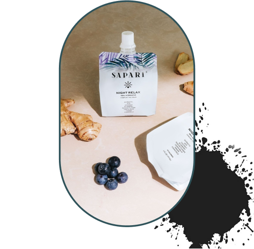 Pouch labeled 'Sapari Night Relax' with ginger and blueberries on a beige surface.