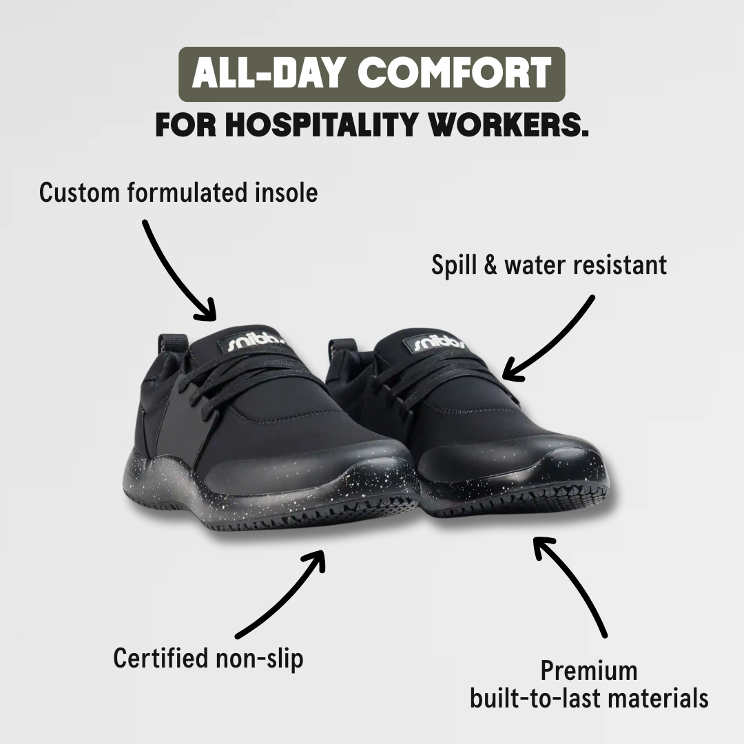 Black shoes with labels: custom insole, non-slip, spill-resistant, premium materials.