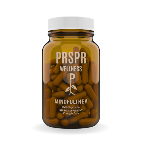 Brown bottle labeled 'PRSPR Wellness' containing herbal supplement capsules.