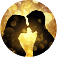 Silhouettes of a couple facing each other with a golden bokeh background.