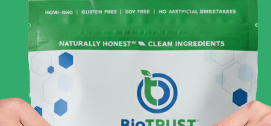 Package of BioTRUST Keto Elevate MCT Oil Powder held by hands.