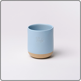A light blue, two-toned cup with the word 'Kinto' on the side against a white background.