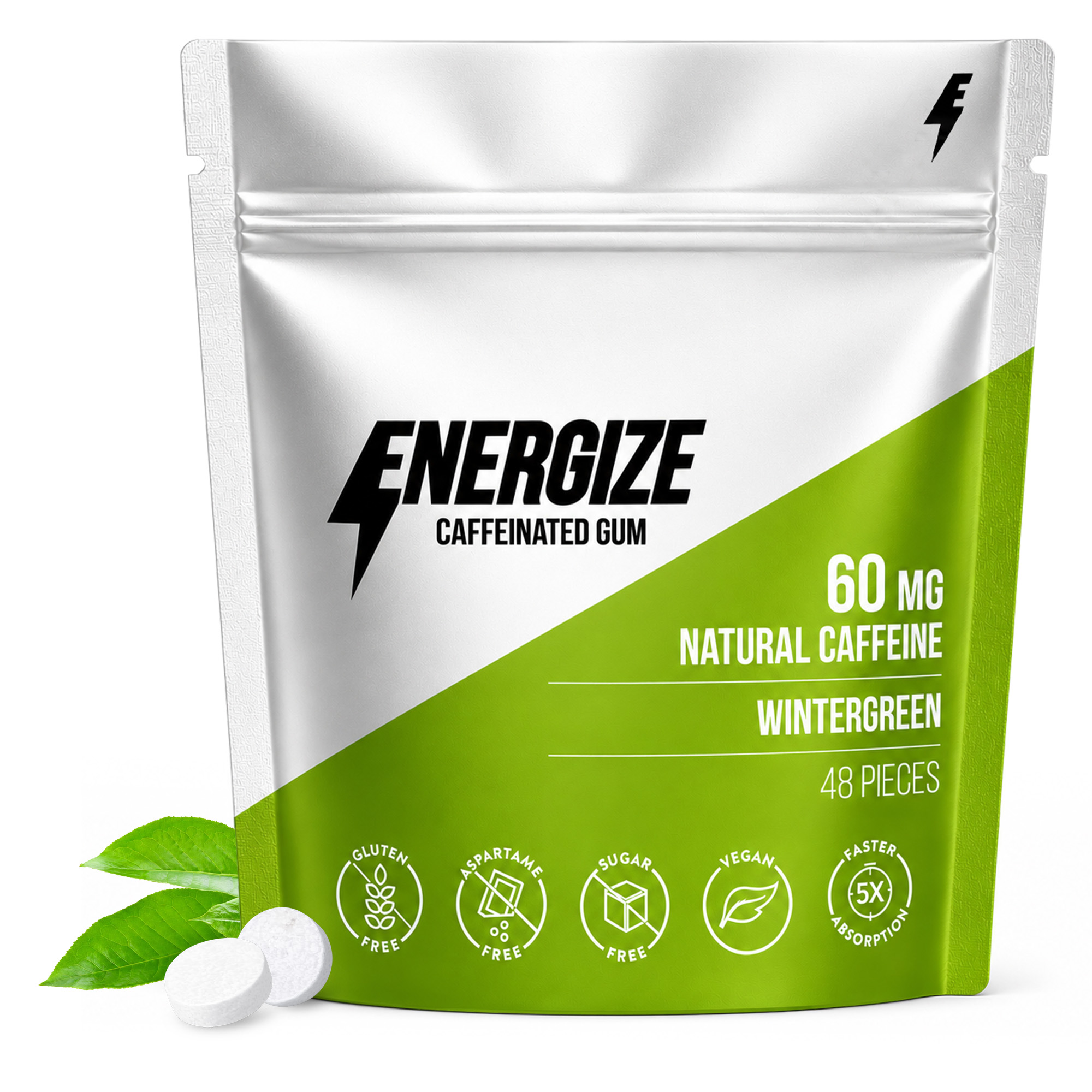 A silver and green pouch of Energize Caffeinated Gum with two gum tablets and leaves next to it.