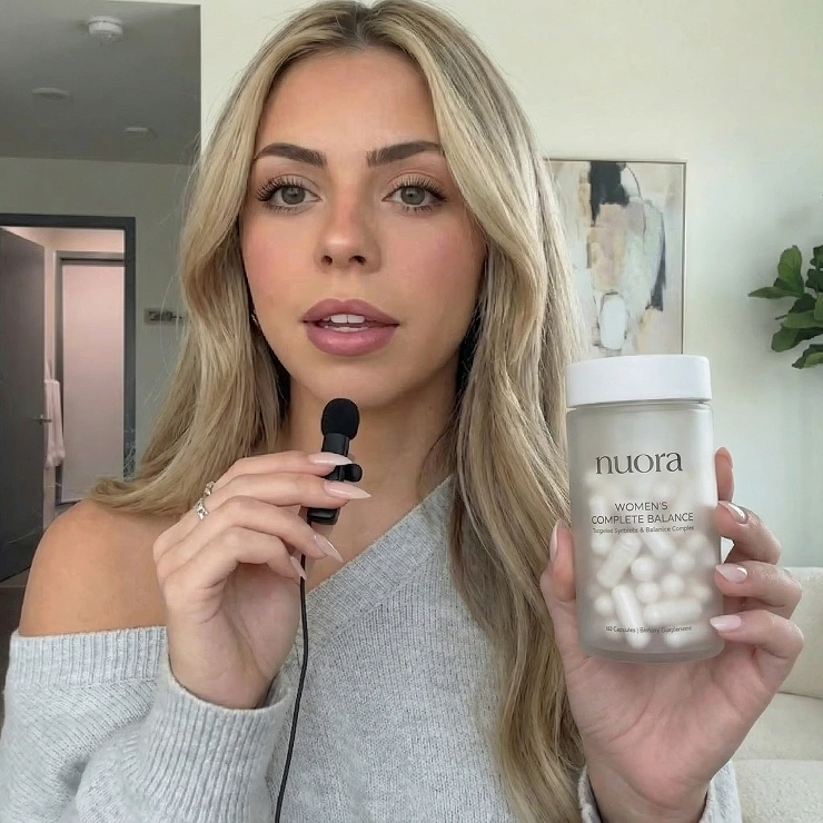 A customer holding the product