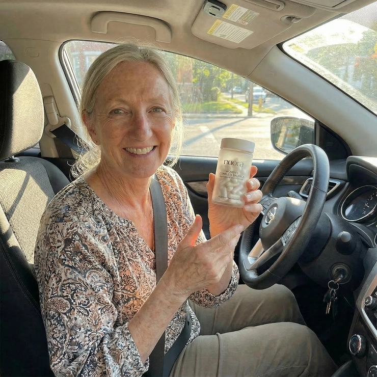 A customer holding the product