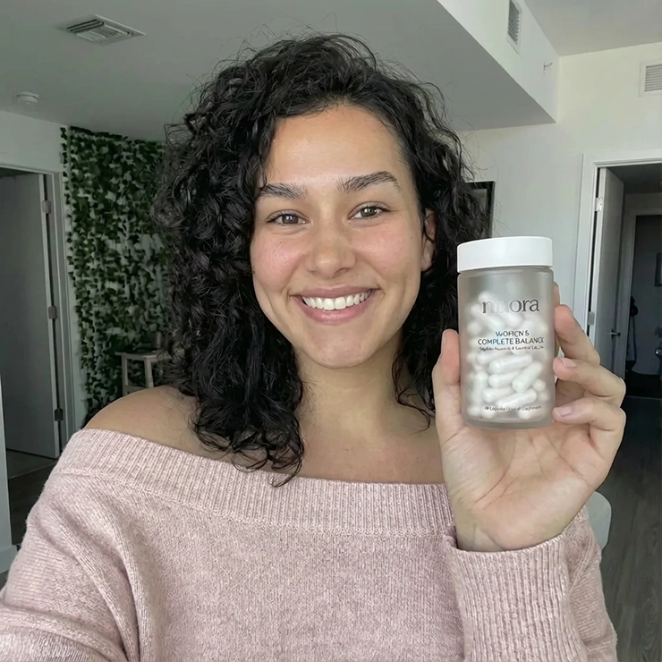 A customer holding the product