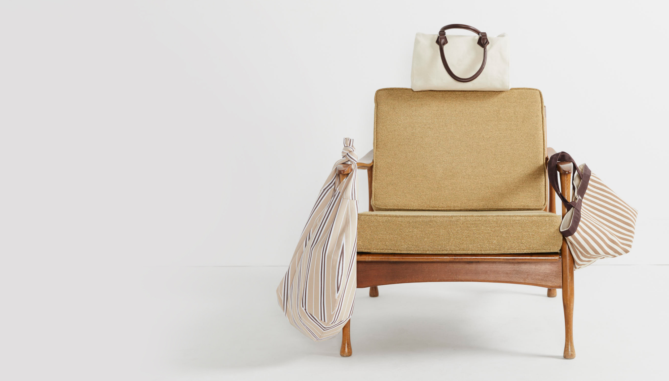 Green chair with bags