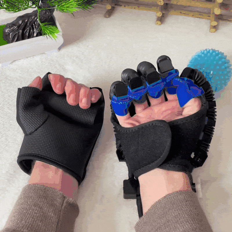 Person wearing black and blue fingerless gloves on both hands.