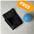 Black fingerless glove and blue massage ball with 'FREE' tag.